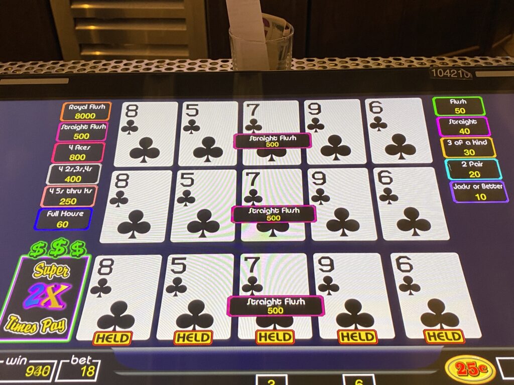 Supertimes pay video poker straight flush of clubs. 