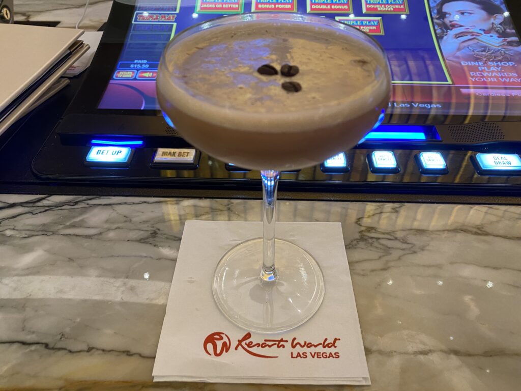 Almond martini on a marble bar.